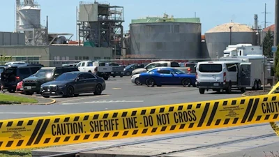 Yellow police tape is seen on May 27, 2026 outside the Longview, Wash. paper mill where a deadly chemical tank failure occurred.