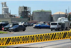Yellow police tape is seen on May 27, 2026 outside the Longview, Wash. paper mill where a deadly chemical tank failure occurred.