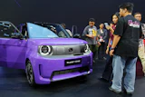 Visitors examine a Honda Super-One EV during the Indonesia International Auto Show organized by the Association of Indonesian Automotive Industries (GAIKINDO) in Tangerang, Indonesia, Thursday, July 30, 2026.