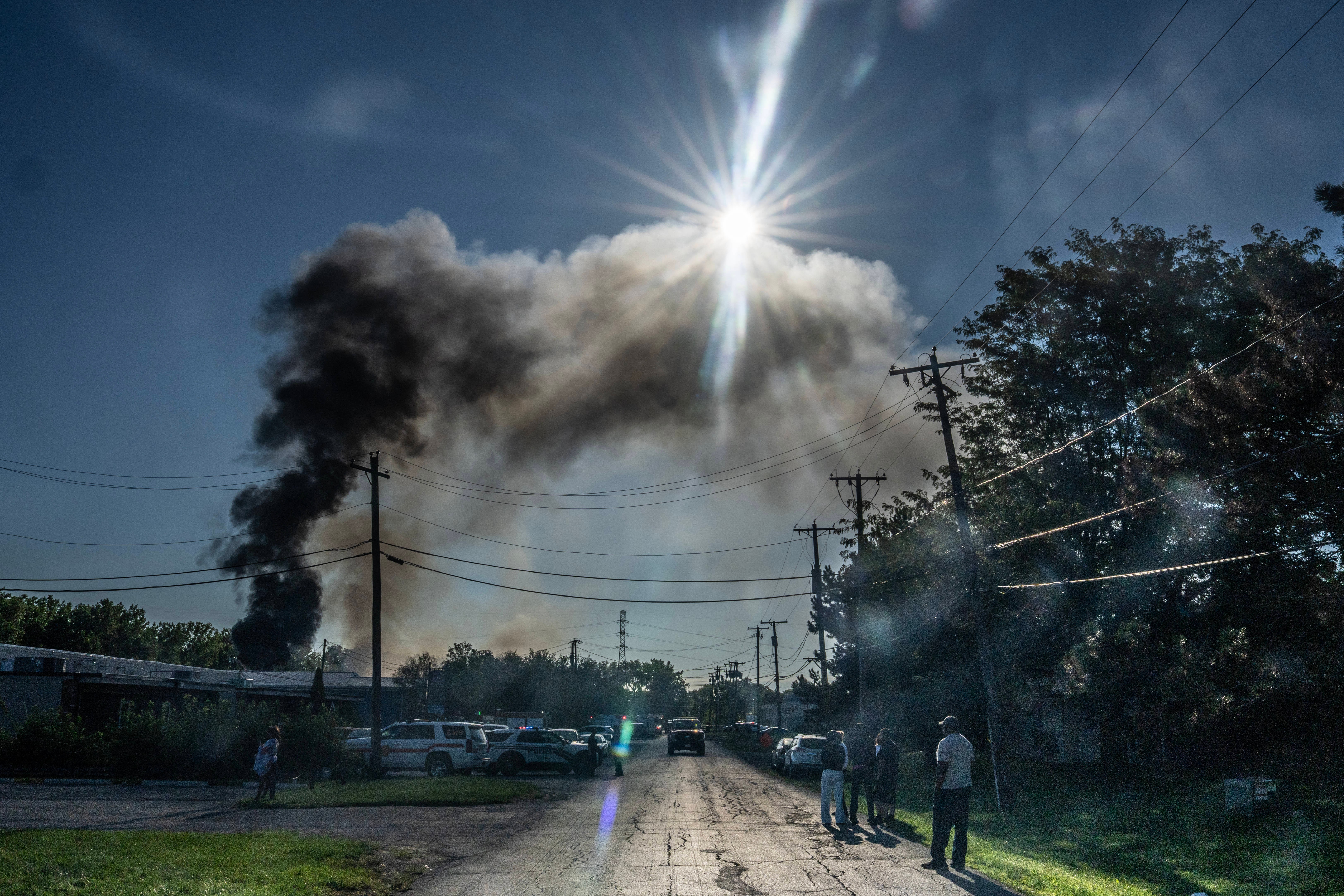 Firefighters work to put out a blaze after an explosion at Brent Industries, Tuesday, Aug. 18, 2026, in Toledo, Ohio.