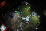 A view of the debris of a Voepass airplane that crashed the previous day, in Vinhedo, Sao Paulo state, Brazil, Aug. 10, 2024.