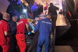 In this image made from video provided by Russian Emergency Situations Ministry press service, medical and rescue workers put those injured in a fire at the Amur Gas Chemical Complex on a plane to Moscow in Blagoveschensk, Amur region, Russia, Thursday, Aug. 27, 2026.