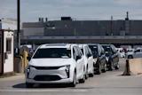 Chrysler Pacificas are driven off the lot at Windsor Assembly Plant in Windsor, Ontario, Canada, on Monday, Aug. 24, 2026.