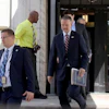 United States Trade Representative Jamieson Greer, center, leaves the U.S. Department of Commerce following a meeting with Canadian officials, in Washington, Monday, Aug. 17, 2026.