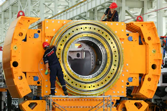 Workers install a tunnel‑boring machine at a factory in Jinhu county in eastern China's Jiangsu province on Aug. 25, 2026.