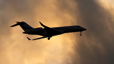 A Bombardier Global Express business jet approaches for landing in Lisbon, on June 13, 2023.