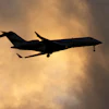 A Bombardier Global Express business jet approaches for landing in Lisbon, on June 13, 2023.