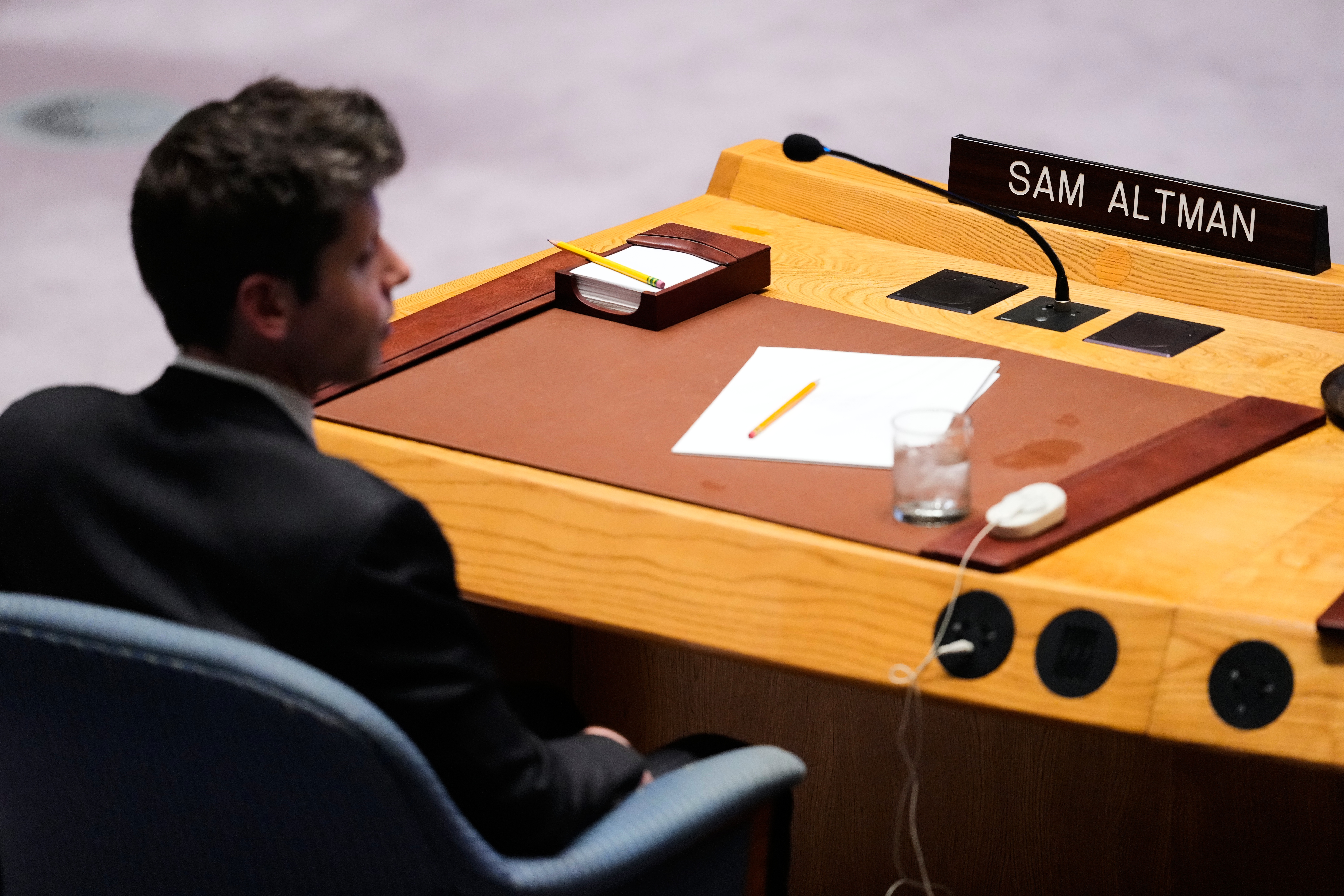 Sam Altman, CEO of OpenAI, listens during a Security Council meeting on artificial intelligence at the 81st session of the United Nations General Assembly, Sept. 23, 2026.
