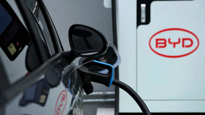 A BYD electric vehicle charges at a dealership in Camacari, Bahia state, Brazil, Friday, March 7, 2025.