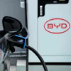 A BYD electric vehicle charges at a dealership in Camacari, Bahia state, Brazil, Friday, March 7, 2025.