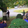 Public demonstration of a large invisibility cloak, showing the cloaking structure being positioned around a tree before an audience. This demonstration, where this portion of the tree disappeared at microwaves, was arranged and witnessed by radar boffin Dr. Eli Brookner and the IEEE Phased Array Conference participants.