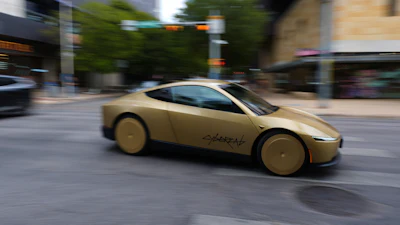 A Tesla Cybercab moves through downtown Austin, Texas, Thursday, Sept. 3, 2026.