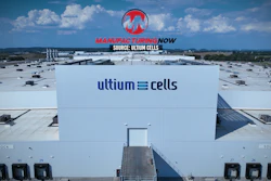 Aerial view of Ultium Cells manufacturing facility with branded signage and loading docks under blue sky