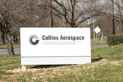 Collins Aerospace corporate sign on landscaped grounds with bare trees and road