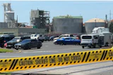 Damage is seen at Nippon Dynawave Packaging Co., after a tank containing hazardous liquid imploded, on Tuesday, May 26, 2026, in Longview, Wash.
