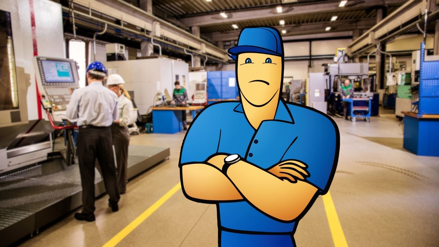 Cartoon mechanic in blue uniform with sad expression stands with crossed arms in industrial manufacturing facility