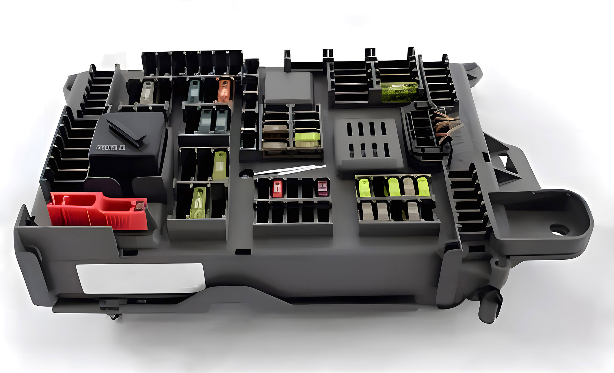 Automotive fuse box with organized yellow and red fuses, relays, and electrical components in black housing
