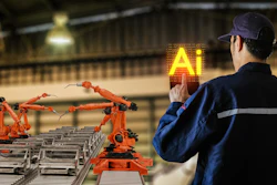 Industrial worker in blue uniform monitoring orange robotic arms on factory assembly line with AI symbol glowing in background