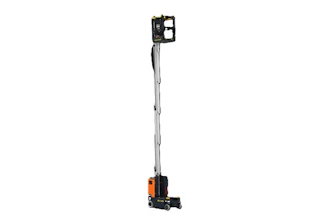 Orange and black mobile elevated work platform with extended boom and work basket