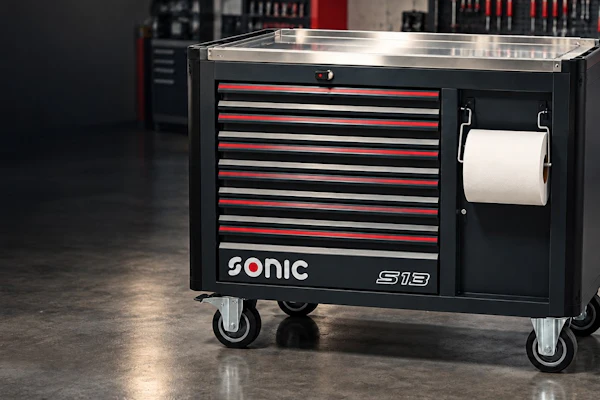 Sonic S19 tool chest with red and black drawers, stainless steel top, and paper towel holder on casters