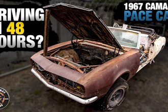 1967 Camaro pace car with open hood revealing engine, featured in 48-hour driving challenge