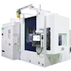 White industrial CNC machining center with dark blue interior cavity and control panel