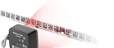 Industrial laser barcode scanner demonstrating QR code reading with red laser beam across multiple codes