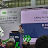Speaker presenting at TITE and IHE Expo 2026 conference podium with event signage displaying Taiwan president information