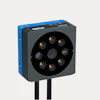 SICK 3D camera sensor with blue and gray housing and circular lens array with gold contact points